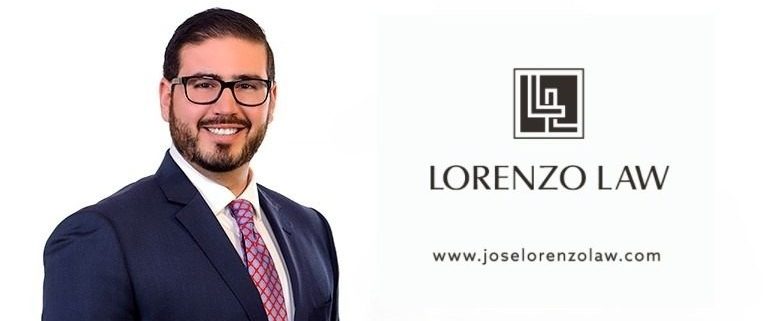Man in suit next to Lorenzo Law logo.