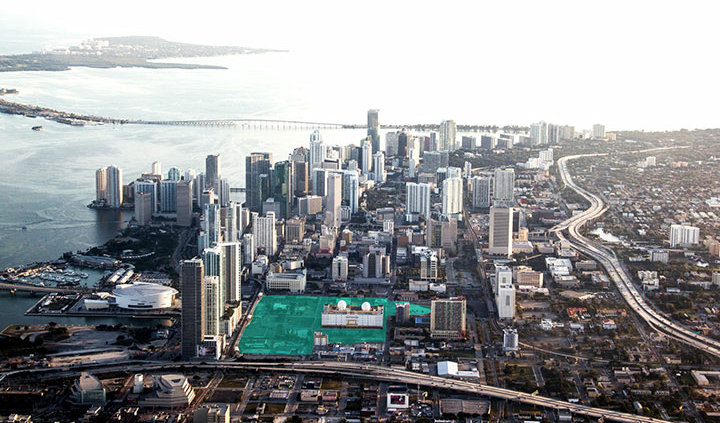 Aerial view of Miami cityscape and coastline.