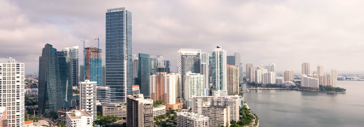 Skyline of modern city by the water.