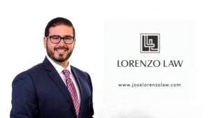 Man in suit beside Lorenzo Law logo.